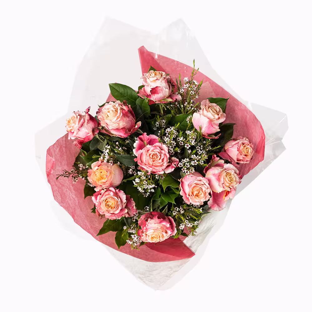 Meinhardt-Fine-Foods-floral-Pink-Rose.jpg A dozen pink roses packed in a bouquet