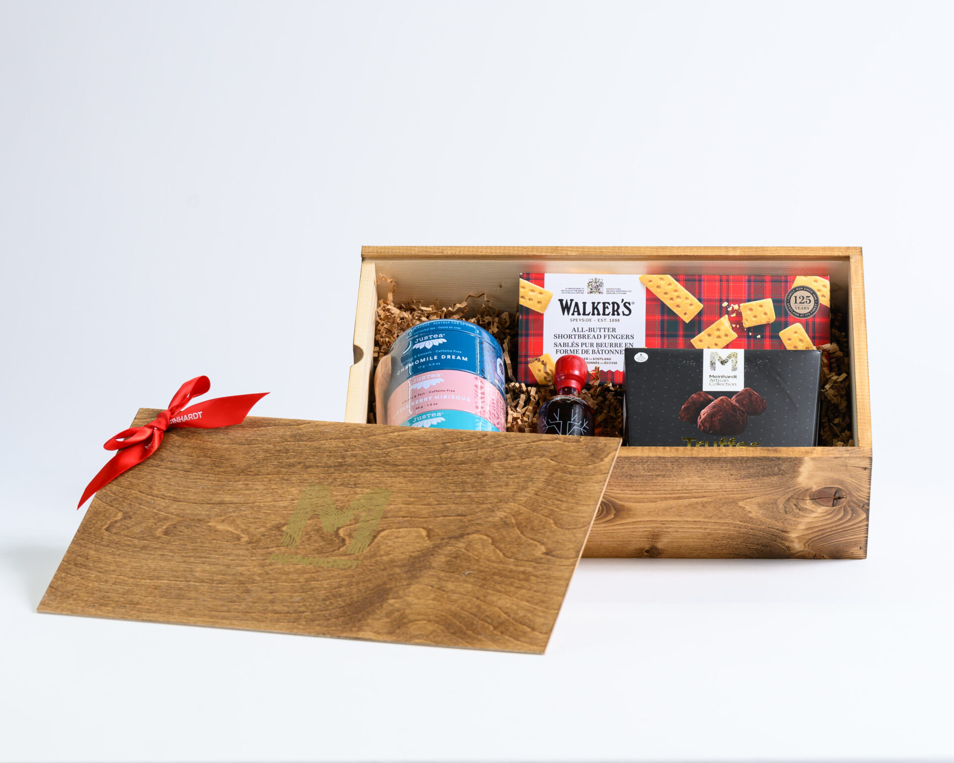 Small wooden box with products for Tea Enthusiasts. 