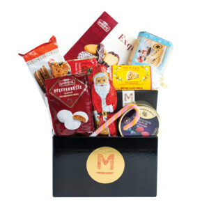 Sweet Holiday Cheers Christmas dessert gift basket with chocolates, cookies, and festive treats.